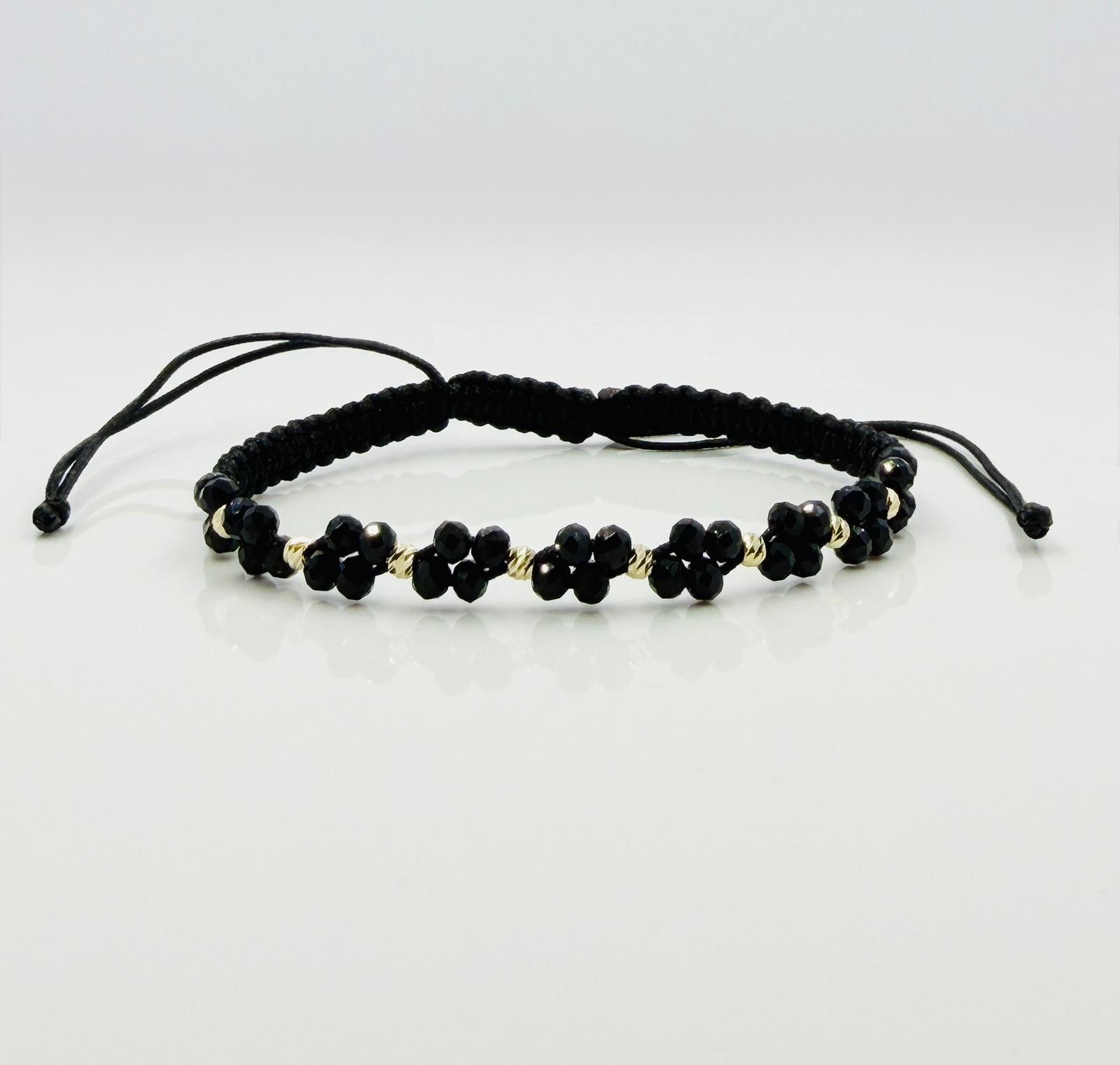 e68df4bb-726b-4c84-b17b-6c9f0ac1e593 Bratara cu snur impletit, cristale si bilute aur 585 14k cod: BRCR25 - imagine 1