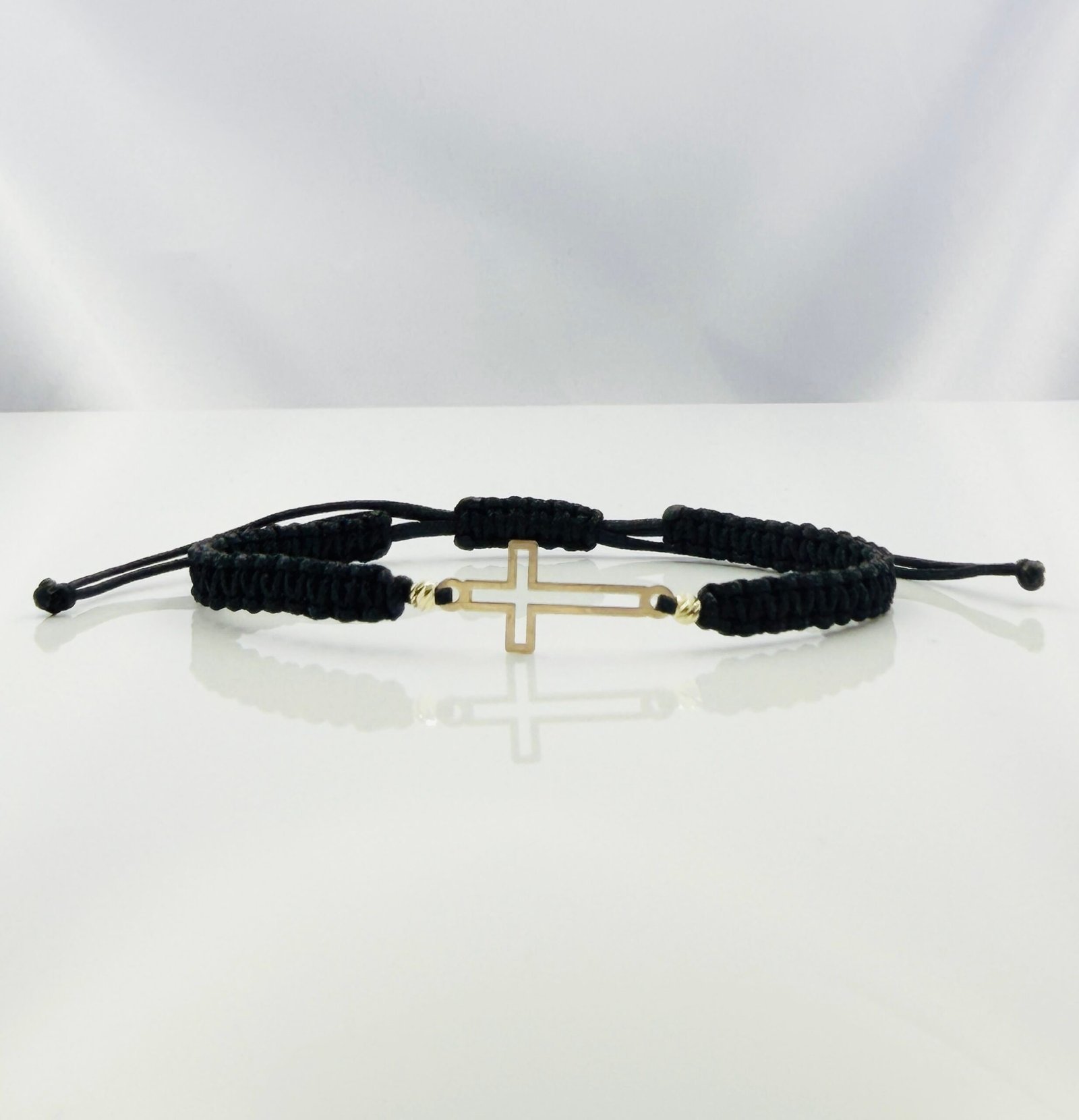 img_4382-2 Bratara cu snur impletit, cruce decupata si 2 bilute de 2,5mm din aur 585 14k cod: BRSN27 - imagine 1